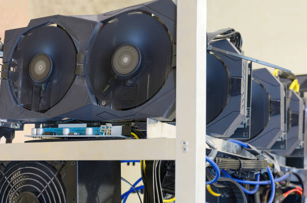 istock Crypt farm with graphic cards for e-currency mining. Computer for Bitcoin mining close-up 845711754