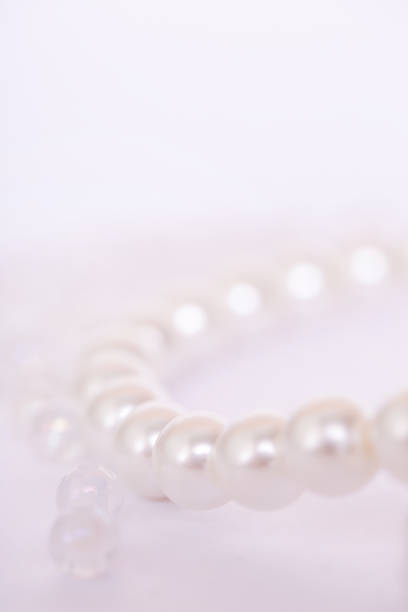 istock Pile of pearls on the white background 845712020