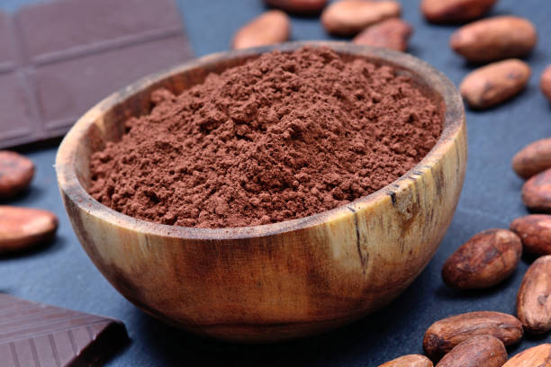 istock Bowl with cacao powder and chocolate on slate 845712254