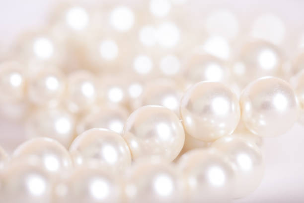 istock Pile of pearls on the white background 845712304