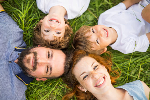 istock Happy family in the meadow 845712434