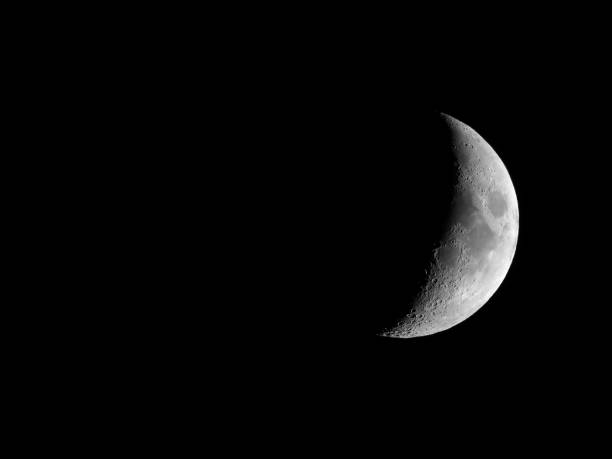 istock Waxing crescent moon seen with telescope 845712474