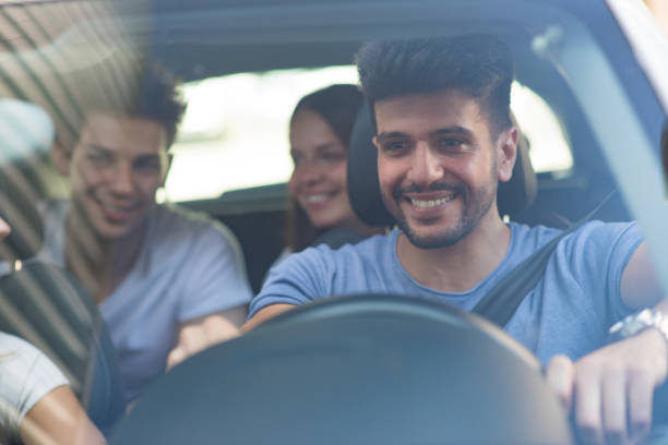 istock Group of friends on a car 845712588