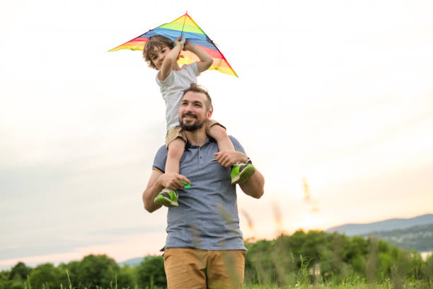 istock father and child on meadow with a kite in the summer 845714870