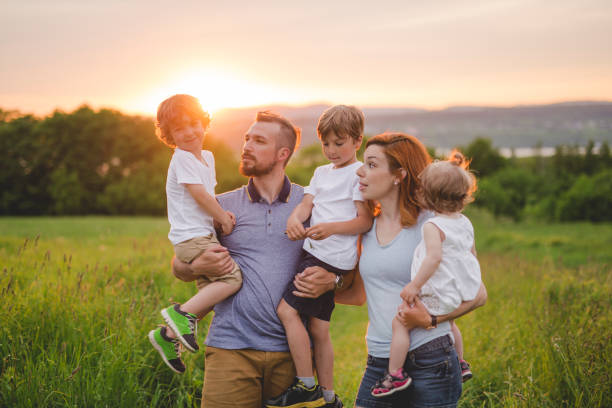 istock Happy family in the meadow 845715360