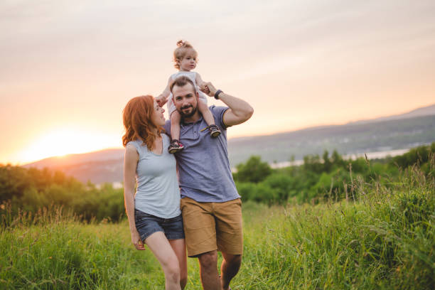 istock young father and mother with their cute daughter 845715646