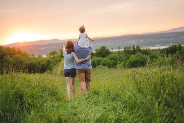 istock young father and mother with their cute daughter 845715760