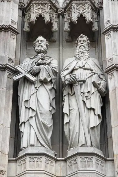 Barcelona in Catalonia, Spain - gothic cathedral detail view. Saint Peter and Saint Paul statues.