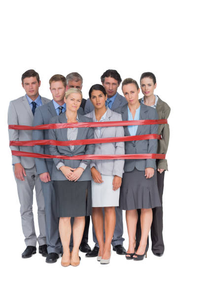 istock Upset business team fastened with adhesive tape 845725196