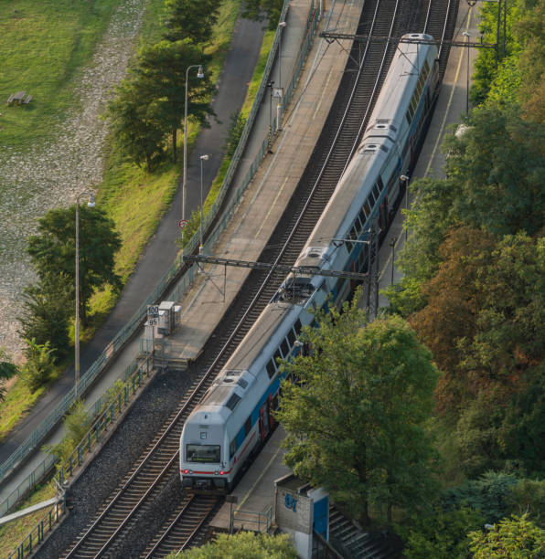 Electric double deck train in valley of river Vltava