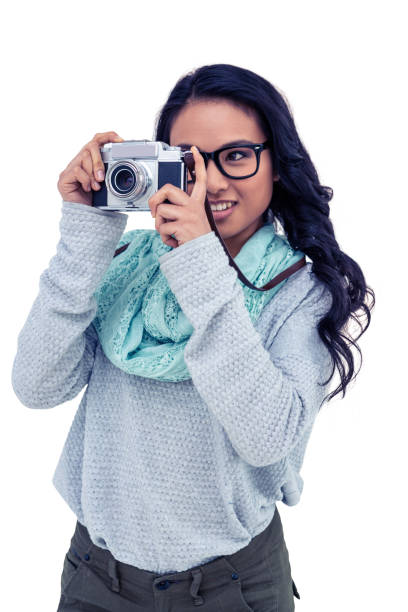 istock Asian woman taking picture with digital camera 845735780