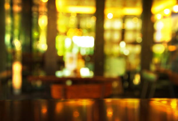 istock blur bar and club with table with light in the night background 845735836