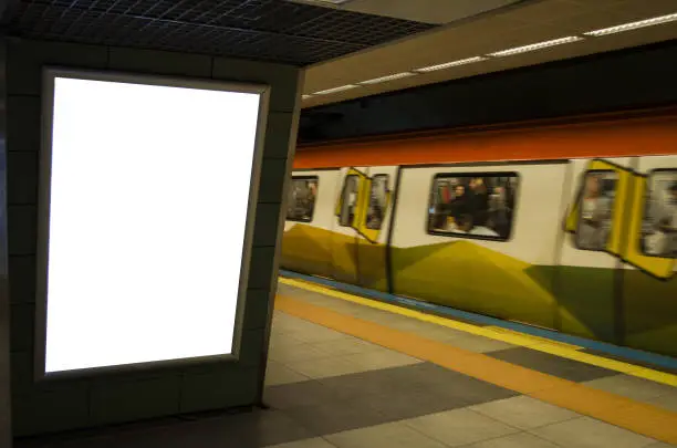 Photo of Blank billboard in subway station