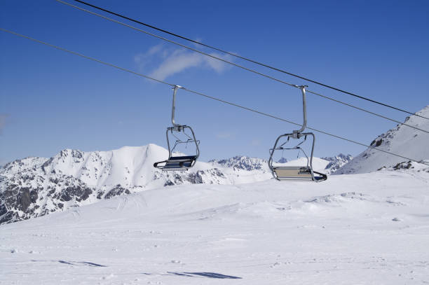 istock Chair lift at ski resort 845736584
