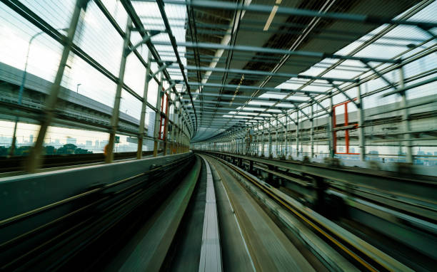 istock Train moving on city rail with motion blur 845742582