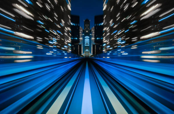 istock Motion blur train moving in city rail tunnel. 845742628