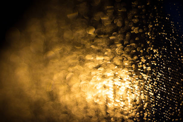 istock Abstract blur background of gold lighting during raining 845745102