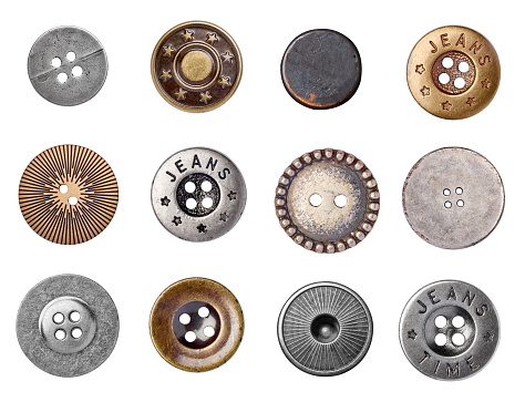 collection of various jeans buttons on white background. each one is shot separately