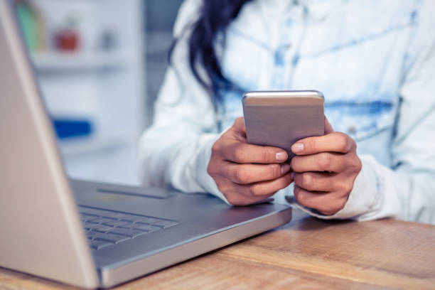 istock Close up of woman using smartphone 845753998