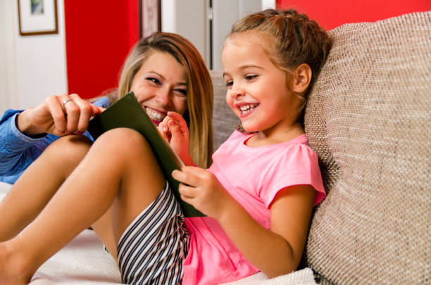 istock Cute beautiful girl reading a book 845754158