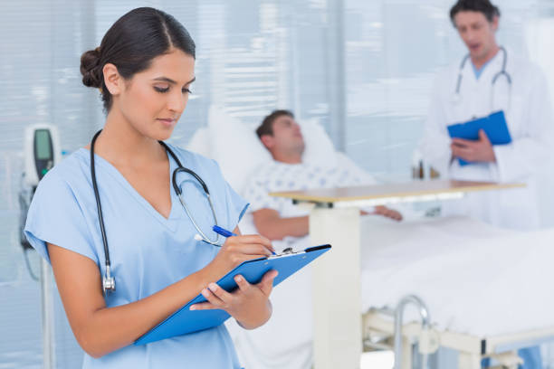 istock Doctors taking care of patient 845758322