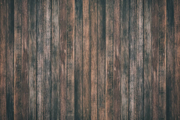 istock Vintage surface wood table and rustic grain texture background. Close up of dark rustic wall made of old wood table planks texture. Rustic brown wood table texture background template for your design. 845763488