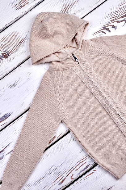 istock Hooded cable knit sweater for kids. 845772664