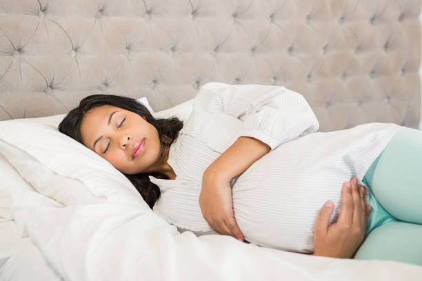 istock Pregnant woman sleeping 845773042