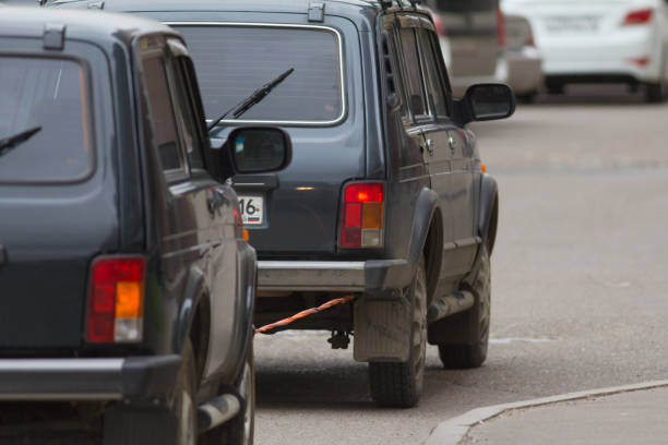 istock Auto towing by car with rope tow 845778952