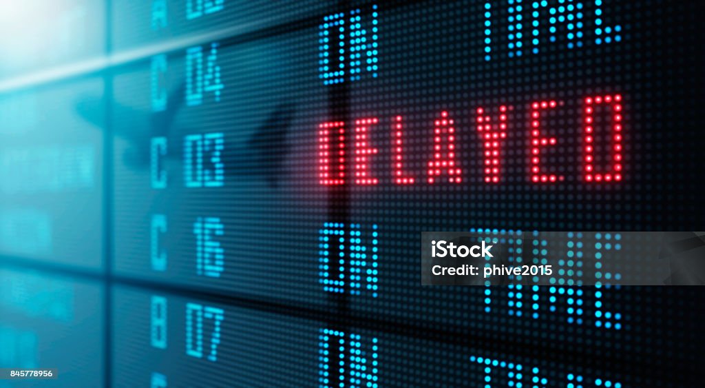 LED Display - Airport flight status board Delayed Sign Stock Photo