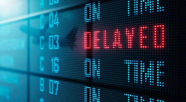 LED Display - Airport flight status board LED Display - Airport flight status board delayed sign photos stock pictures, royalty-free photos & images