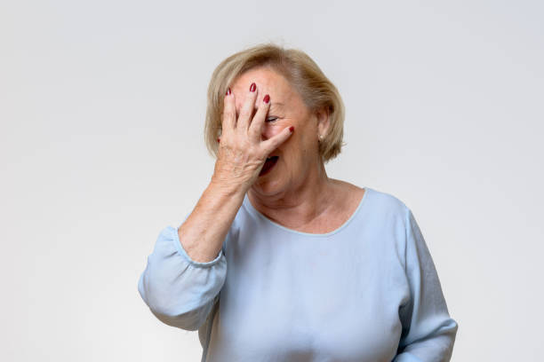 istock Senior woman covering her face with her hand 845779462