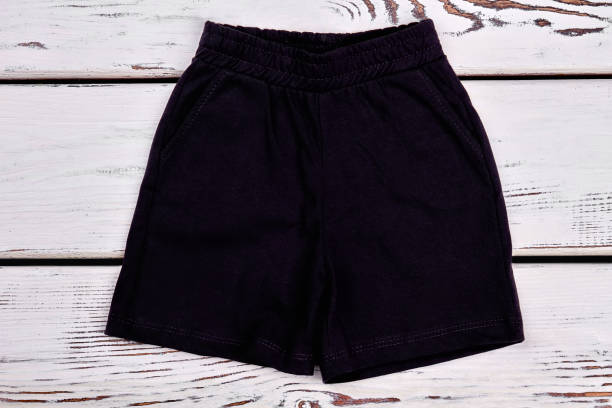 istock Little boy cute black shorts. 845782548