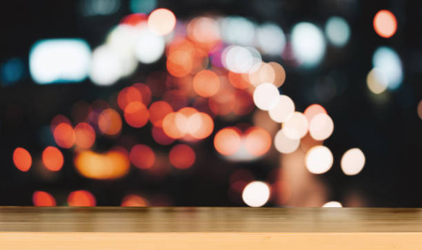 istock Product display montage Concept. Empty top wood table and blur city night background. 845783020