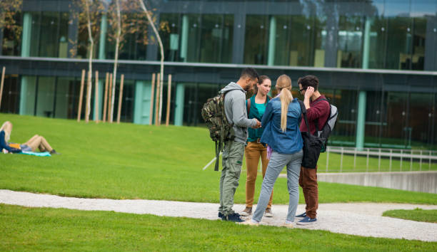 istock University Students Hanging Out In A Park 845786462