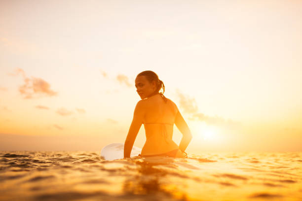 istock young surfer woman 845788974