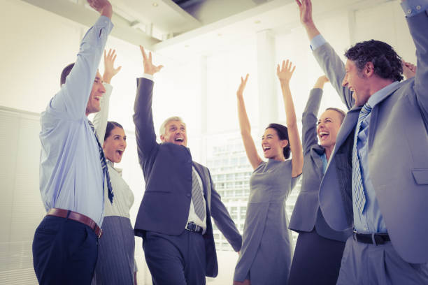 istock Business team celebrating a good job 845789964