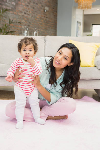 istock Happy mother with her baby daughter 845790302