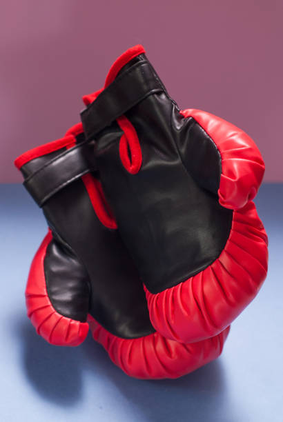 istock red Boxing gloves on a pink background, 845796496