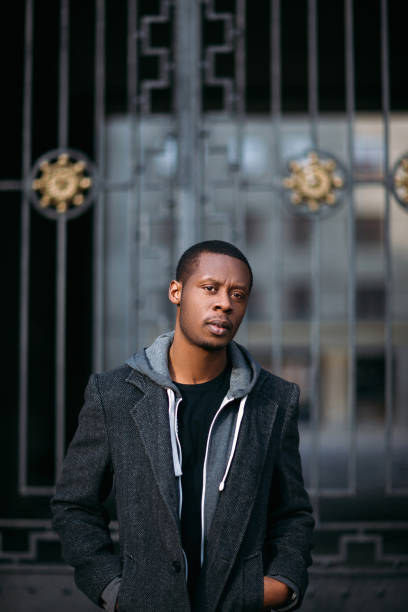 istock Doubtful male on street. Facial expression 845799740
