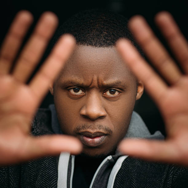 istock Black male with stop gesture in selective focus 845799760