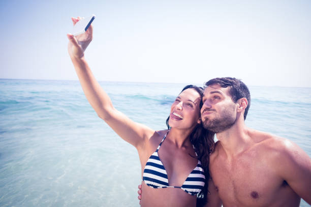 istock Happy couple taking a selfie 845799956