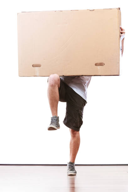 istock Delivery man holding a paper box. 845813578