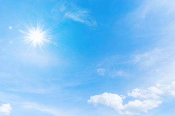 istock Blue sky background with the sun,Blue sky with white clouds floating in the sky. 845817856