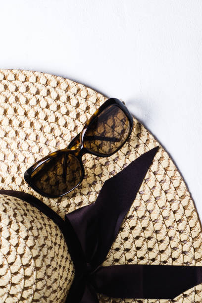 istock Women's hat and sunglasses on white background 845817916
