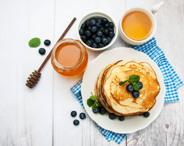 istock Plate with pancakes and blueberries 845821916