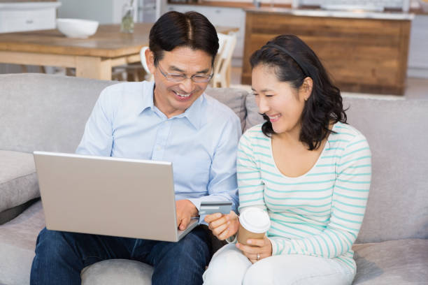 istock Happy couple shopping online 845824148