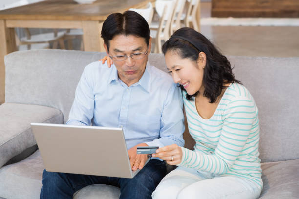 istock Happy couple shopping online 845824168