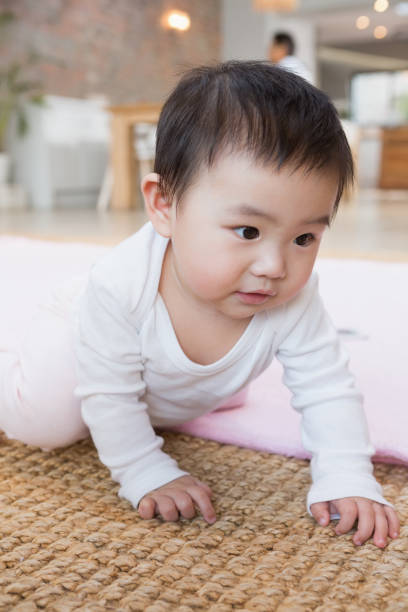istock Cute baby on the carpet 845824254