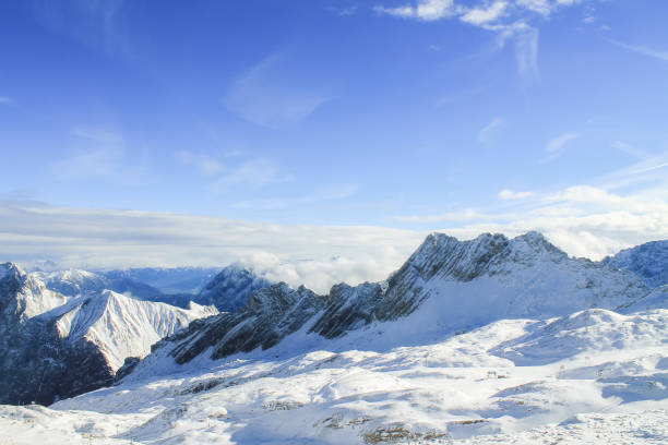 istock View of a mountain range with snow and clouds 845824498